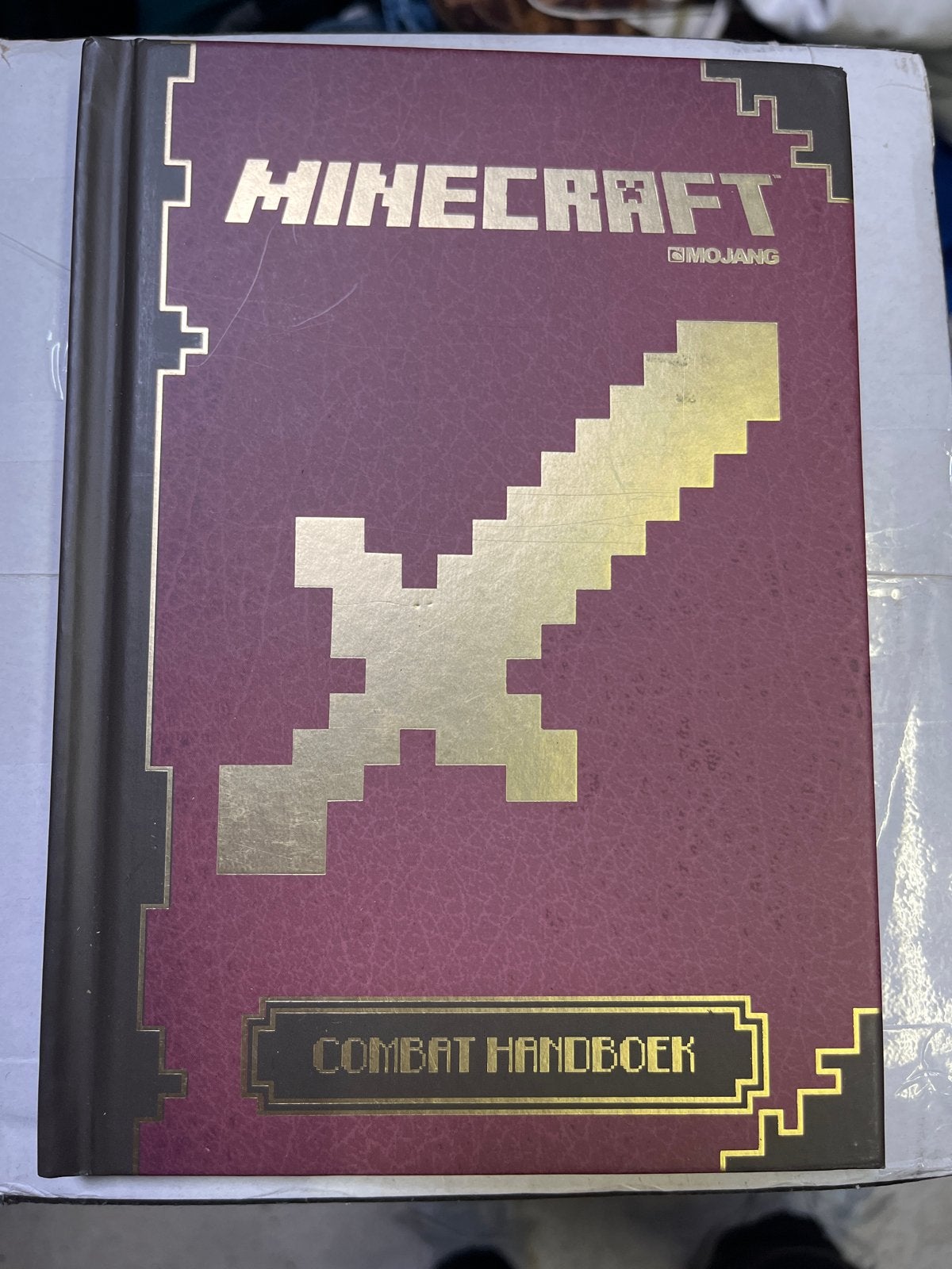 Minecraft Combat Handboek - Leer overleven en vechten, Ophalen of Verzenden, Zo goed als nieuw, Non-fictie