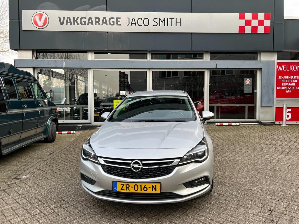 Opel Astra Sports Tourer 1.4 Turbo 120 Jaar Edition, Voorwielaandrijving, Stof, Gebruikt, Euro 6