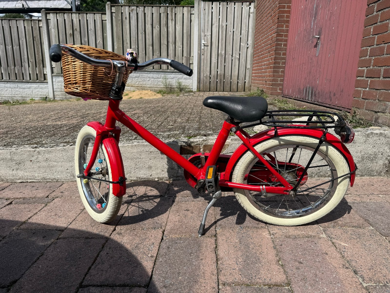 Dames kinderfiets 12 inch rood met mandje, Ophalen, Gebruikt, Terugtraprem, Minder dan 16 inch