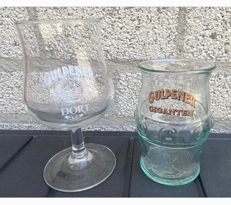 2 Gulpener bierglazen - Dort & Giganten. H.15,5&11,5 cm., Ophalen of Verzenden, Zo goed als nieuw, Glas of Glazen, Gulpener
