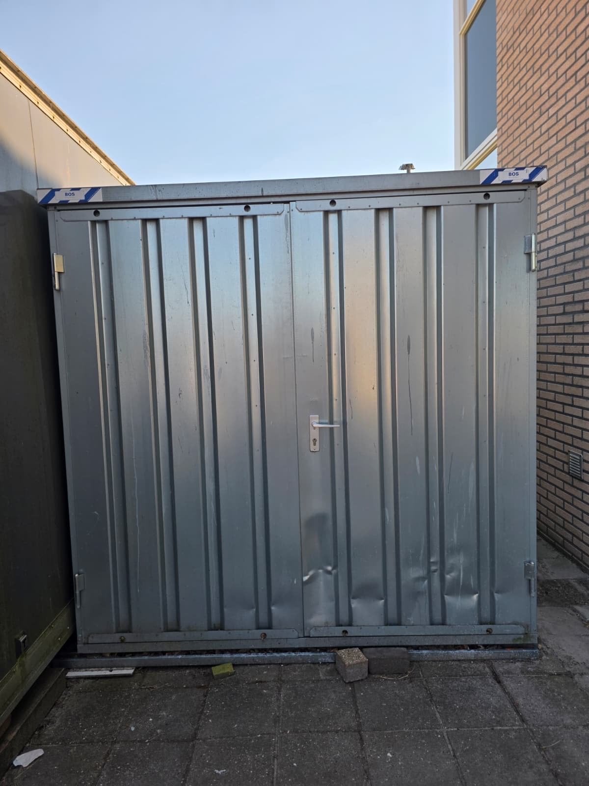 Robuuste demontabele opslagcontainer, Ophalen