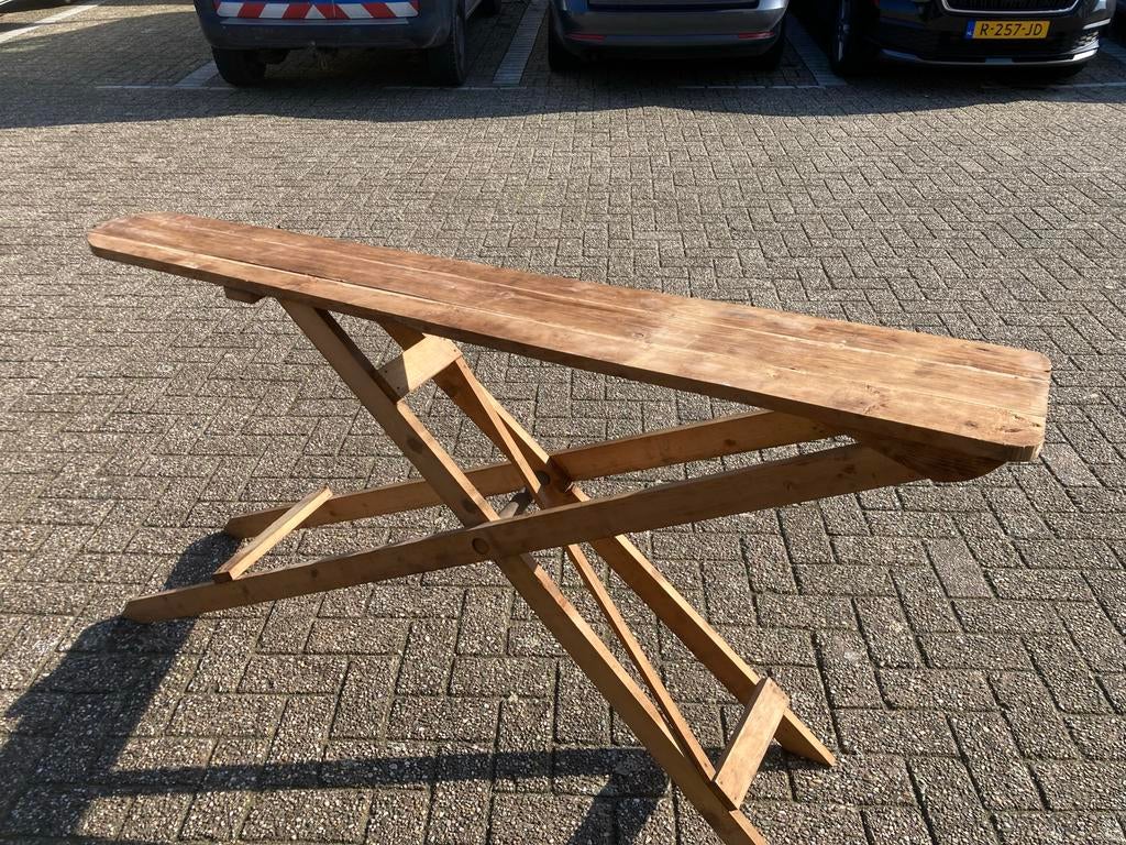 Oude houten strijkplank, Ophalen