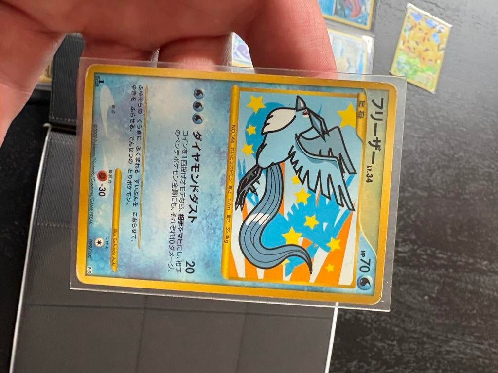 Articuno, Ophalen of Verzenden, Zo goed als nieuw, Meerdere kaarten, Foil