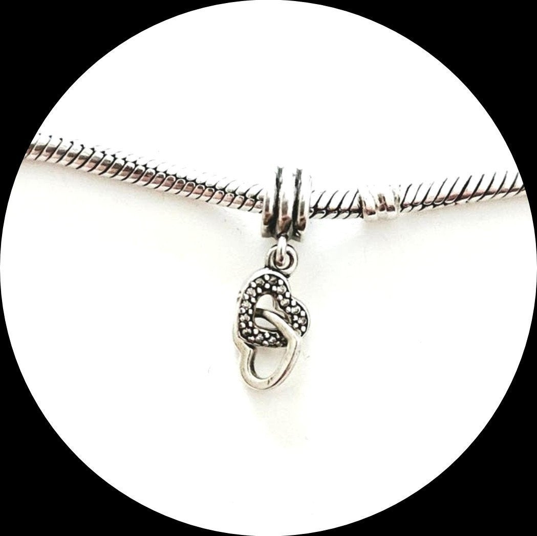 Pandora hanger Verstrengelde Harten 791242CZ / zirkonia, Gebruikt, Pandora, Ophalen of Verzenden, 1 bedel