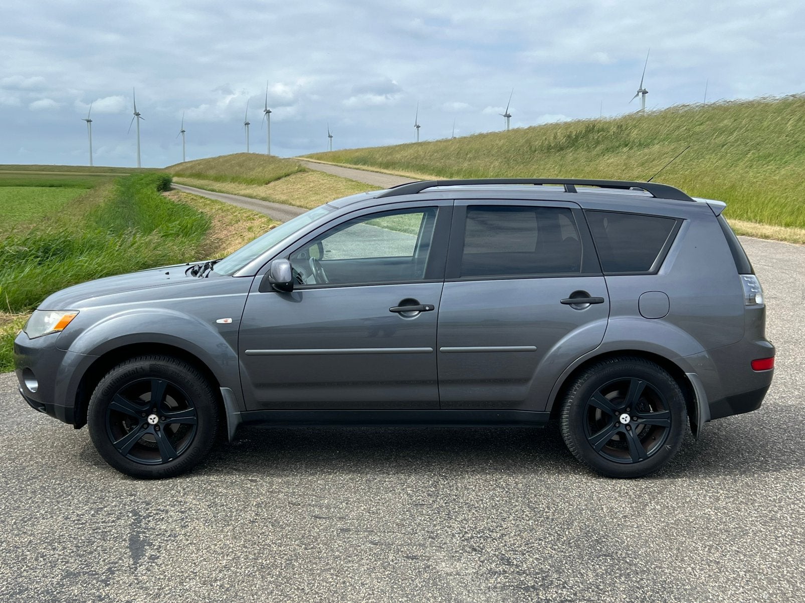 Mitsubishi Outlander 2WD 223PK V6 aut airco schuifdak enz, Auto's, Mitsubishi, Stof, Outlander, 1500 kg, Particulier