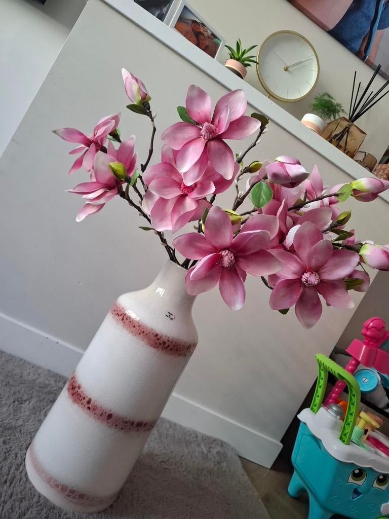 Vaas + kunstbloemen, Ophalen