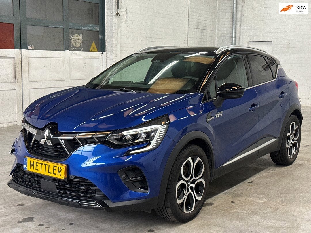 Mitsubishi ASX 1.6 HEV AT First Edition | Camera | Navigatie, Auto's, 94 pk, Gebruikt, 4 cilinders, Blauw