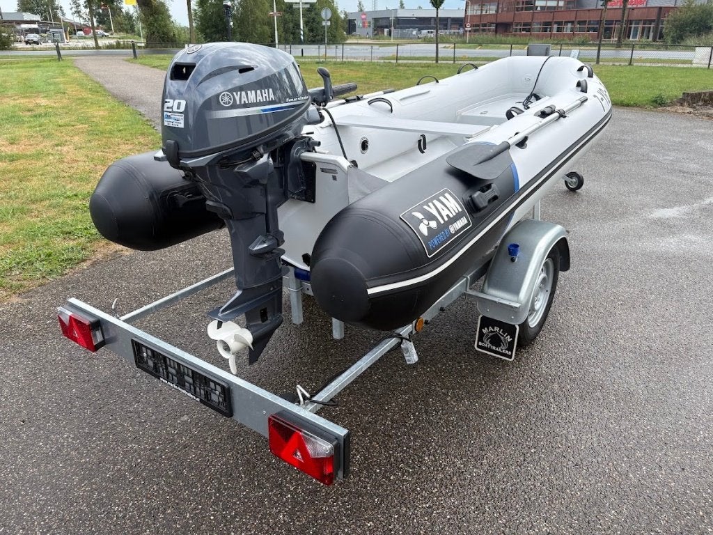 Yam 350TAF aluminium rib met Yamaha 20pk / Marlin trailer