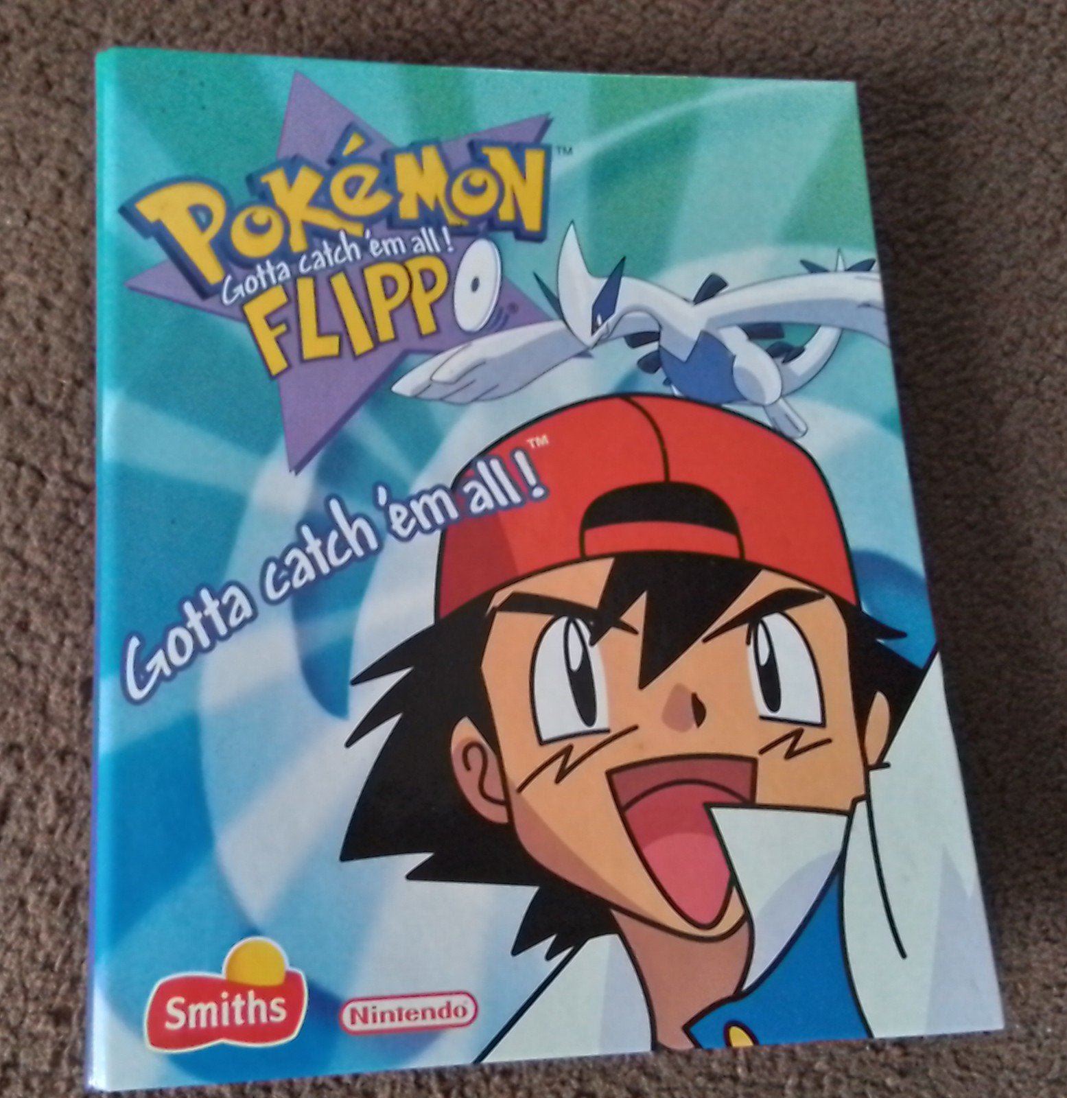Pokémon Flippo Verzamelmap met Flippo's - Zeldzaam!, Verzamelen, Ophalen of Verzenden, Adventure, Verzameling, Met verzamelmap(pen)