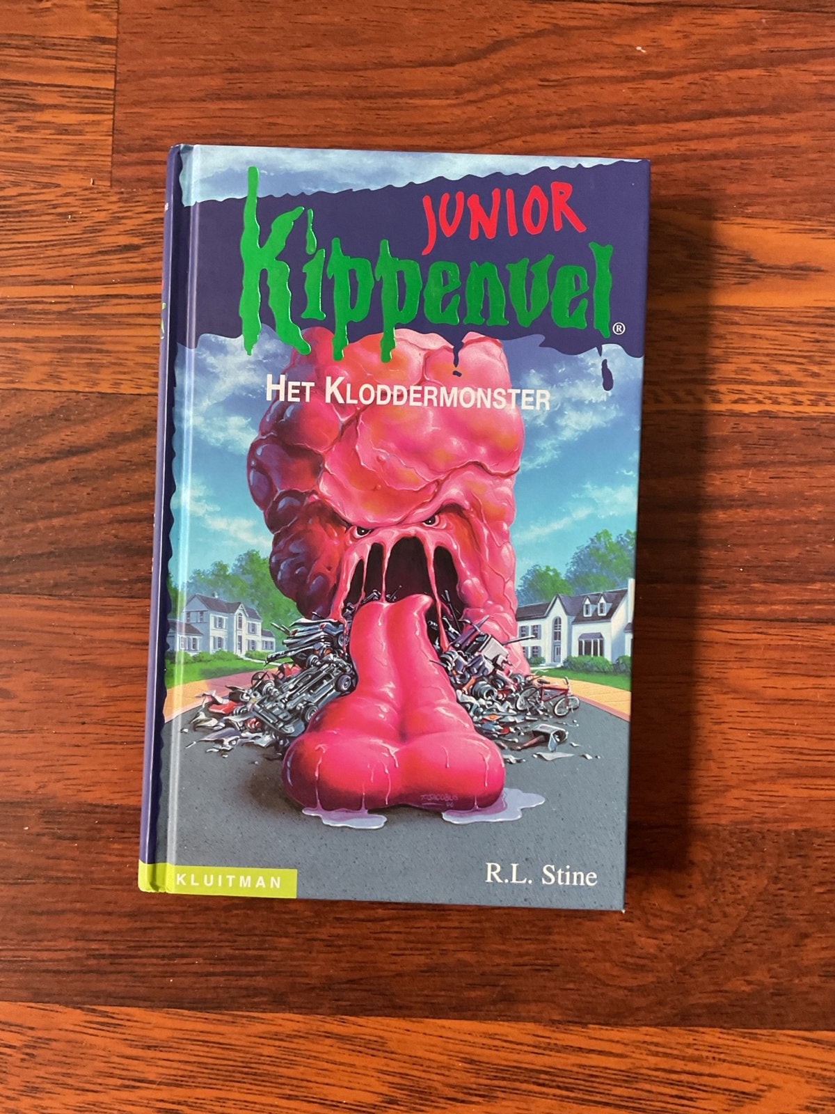 Junior Kippenvel: Het Kloddermonster - R.L. Stine, Ophalen of Verzenden, Zo goed als nieuw