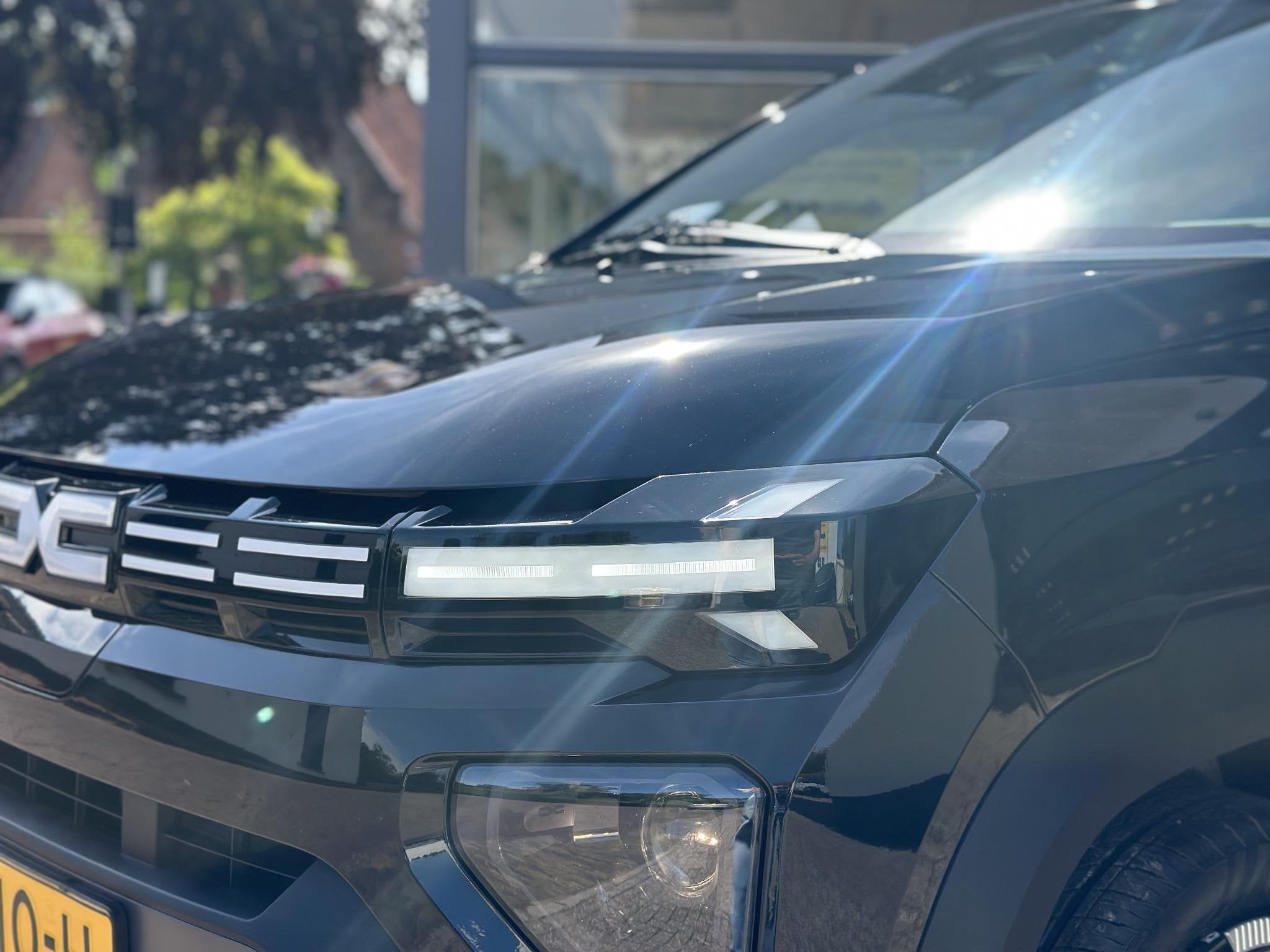 Dacia Spring Expression 65 26.8 kWh | DC lader met een maxim, Auto's, Stof, Gebruikt, 4 stoelen, Zwart