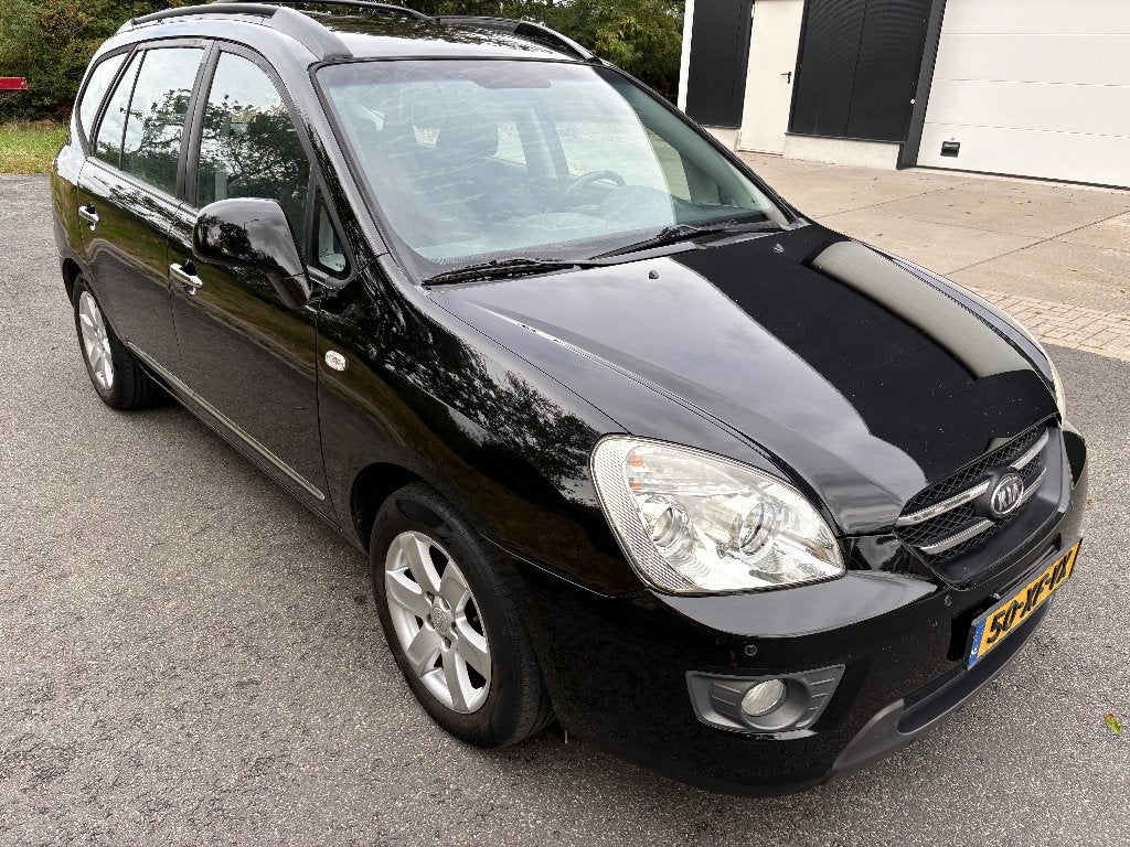 Kia Carens 2.0 Cvvt 5-ZIT AUT 2007 Zwart. 1e EIGENAAR, 1998 cc, Stof, Zwart, 4 cilinders
