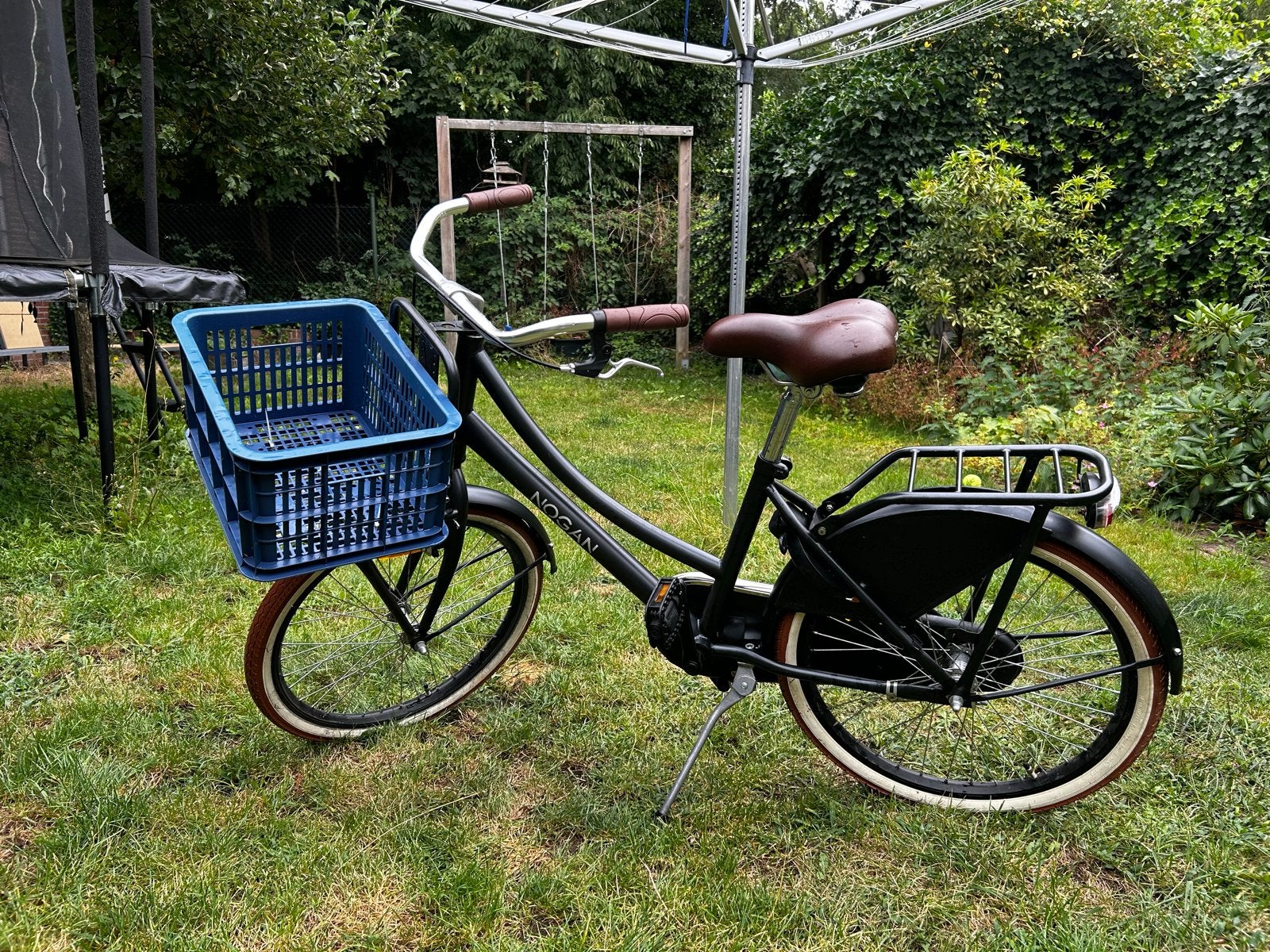 Nogan Vintage Transportfiets 22 inch Meisjes Mat Zwart, Fietsen en Brommers, Fietsen | Meisjes, Ophalen, Gebruikt, Terugtraprem