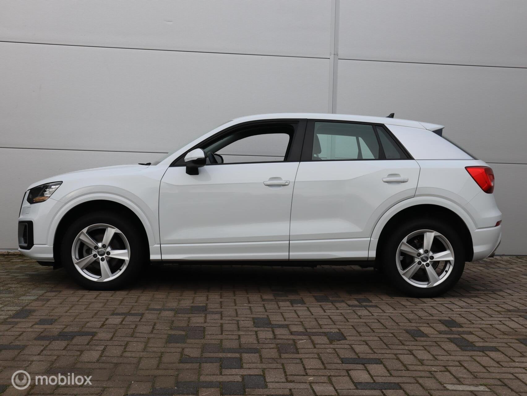 Audi Q2 30 TFSI Sport Airco Cruise Navi PDC Parelmoer, Auto's, Voorwielaandrijving, Stof, Gebruikt, 1200 kg
