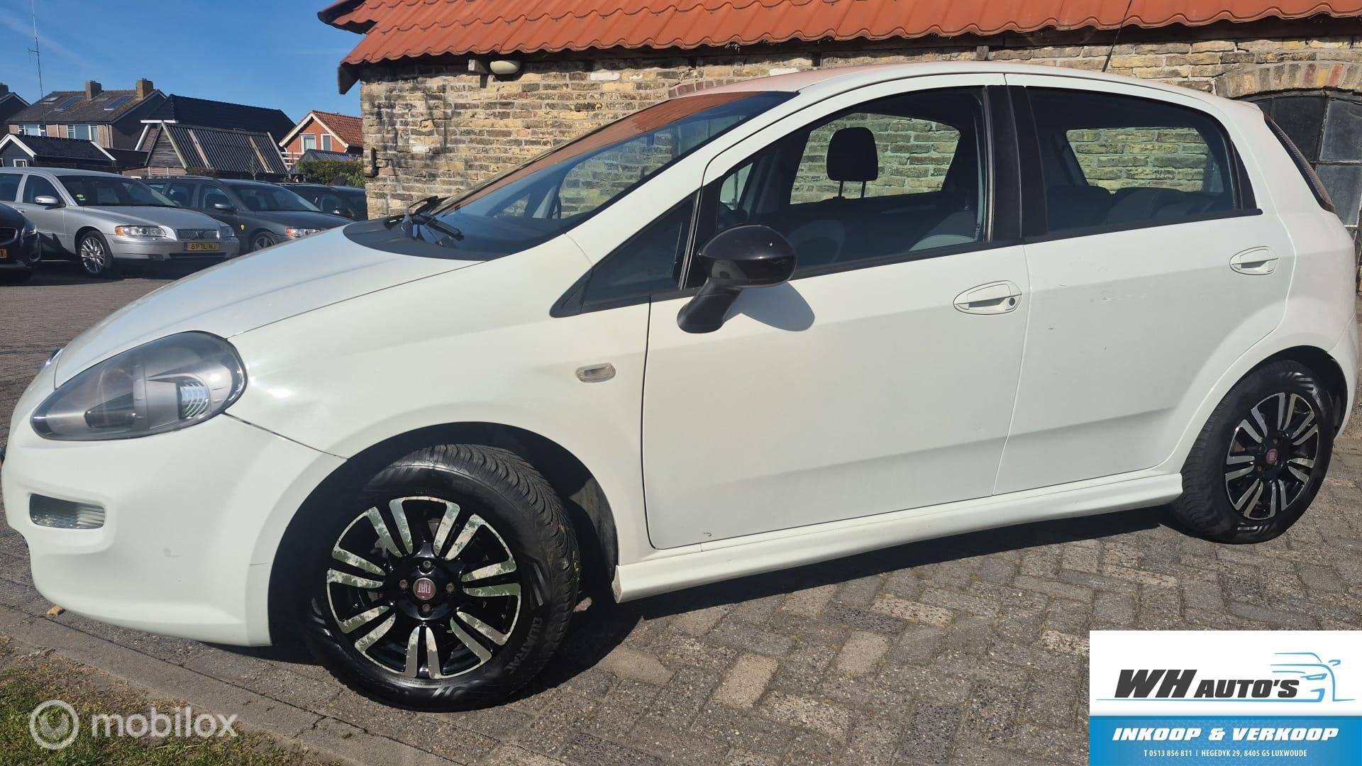 Fiat Punto Evo 0.9 TwinAir Lounge, Auto's, Voorwielaandrijving, Euro 5, 86 pk, Gebruikt