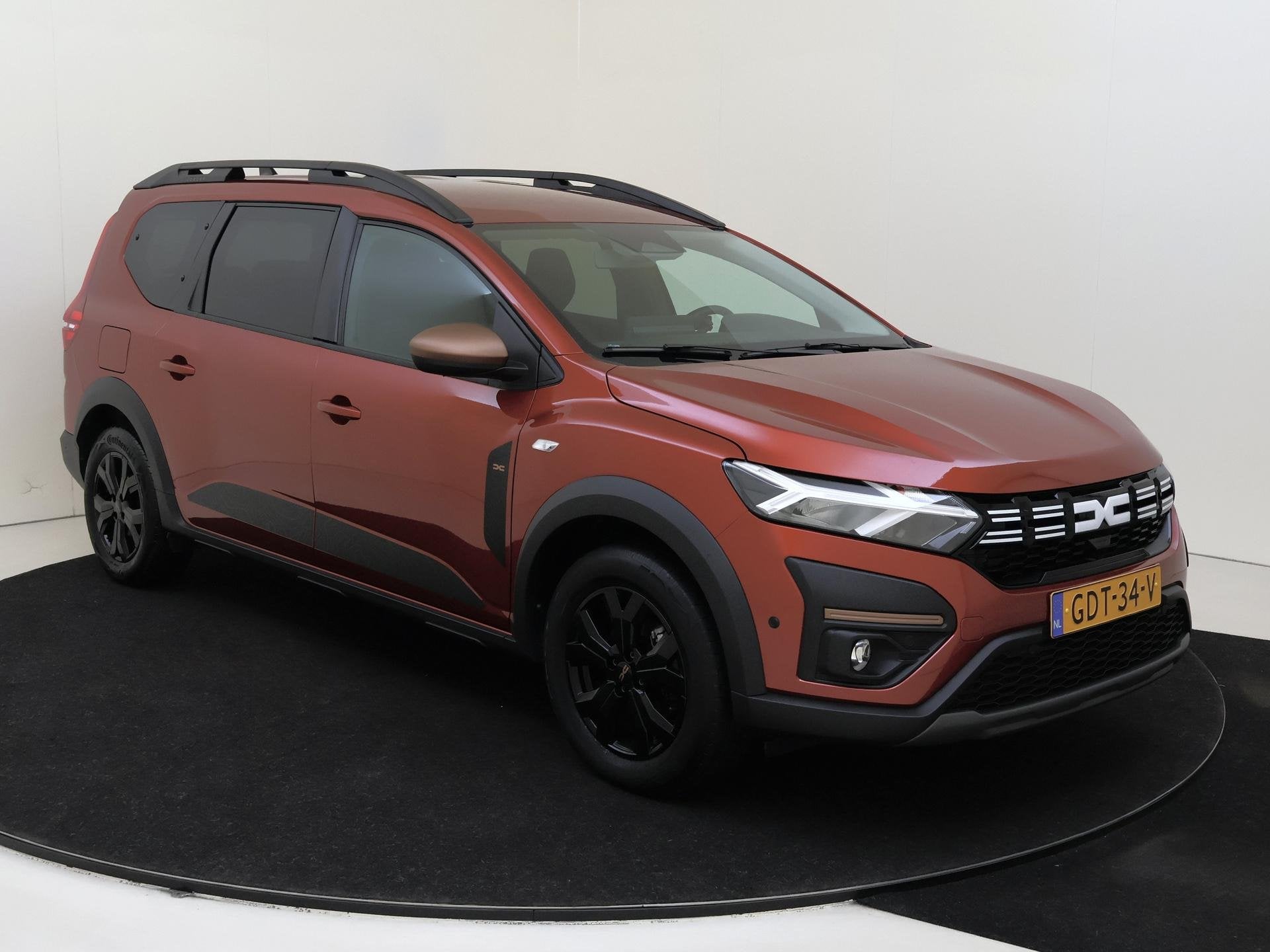 Dacia Jogger 1.6 Hybrid 140 Extreme 7p. | 1e Eigenaar | Navi, Auto's, Gebruikt, 4 cilinders, Bruin, 7 stoelen