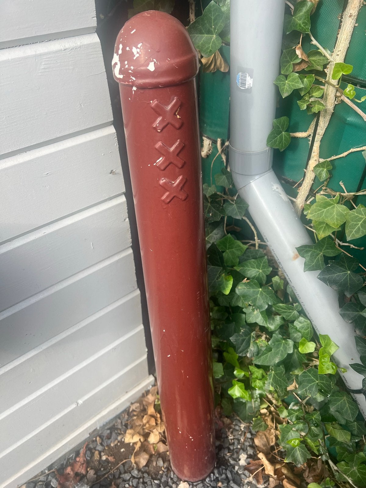 Authentieke Amsterdamse paal met XXX-symbool, Ophalen