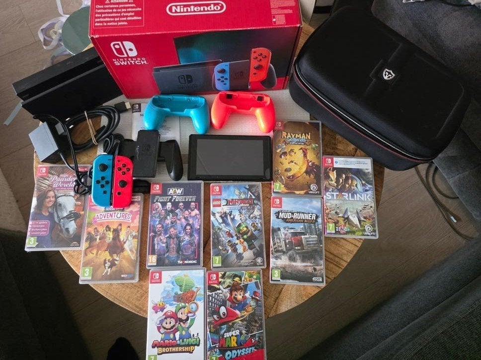 Nintendo Switch V2 met 9 games en krasvrij scherm, Ophalen of Verzenden