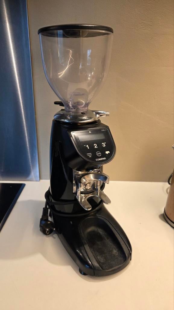 Compak E5 koffiemolen, Ophalen