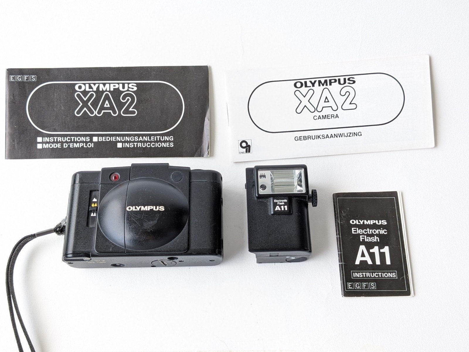 Goede Olympus XA2 met boekjes en flitser, Audio, Tv en Foto, Fotocamera's Analoog, Ophalen of Verzenden, Compact, Olympus