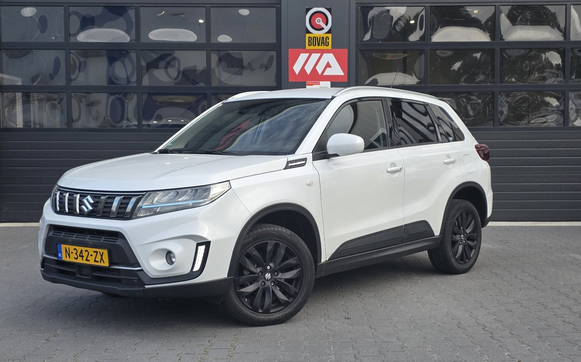 Suzuki Vitara 1.4 Boosterjet Style Smart Hybrid | TREKHAAK |, Auto's, Dealer onderhouden, Stof, 4 cilinders, 129 pk