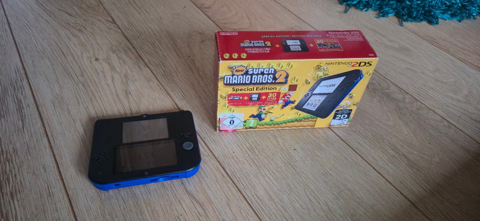 Nintendo 2DS Zwart/Blauw met New Super Mario Bros. 2, Spelcomputers en Games, Spelcomputers | Nintendo 2DS en 3DS, Ophalen of Verzenden