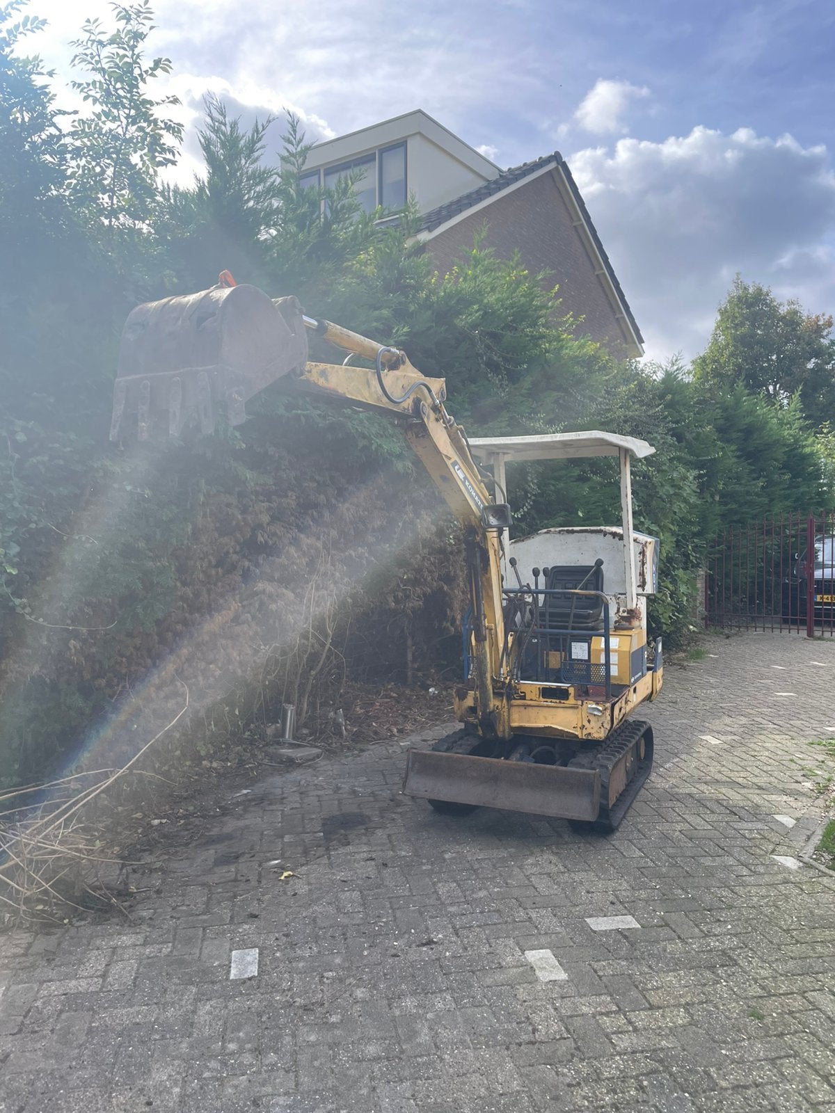 Komatsu PC07 Minigraver + aanhanger.