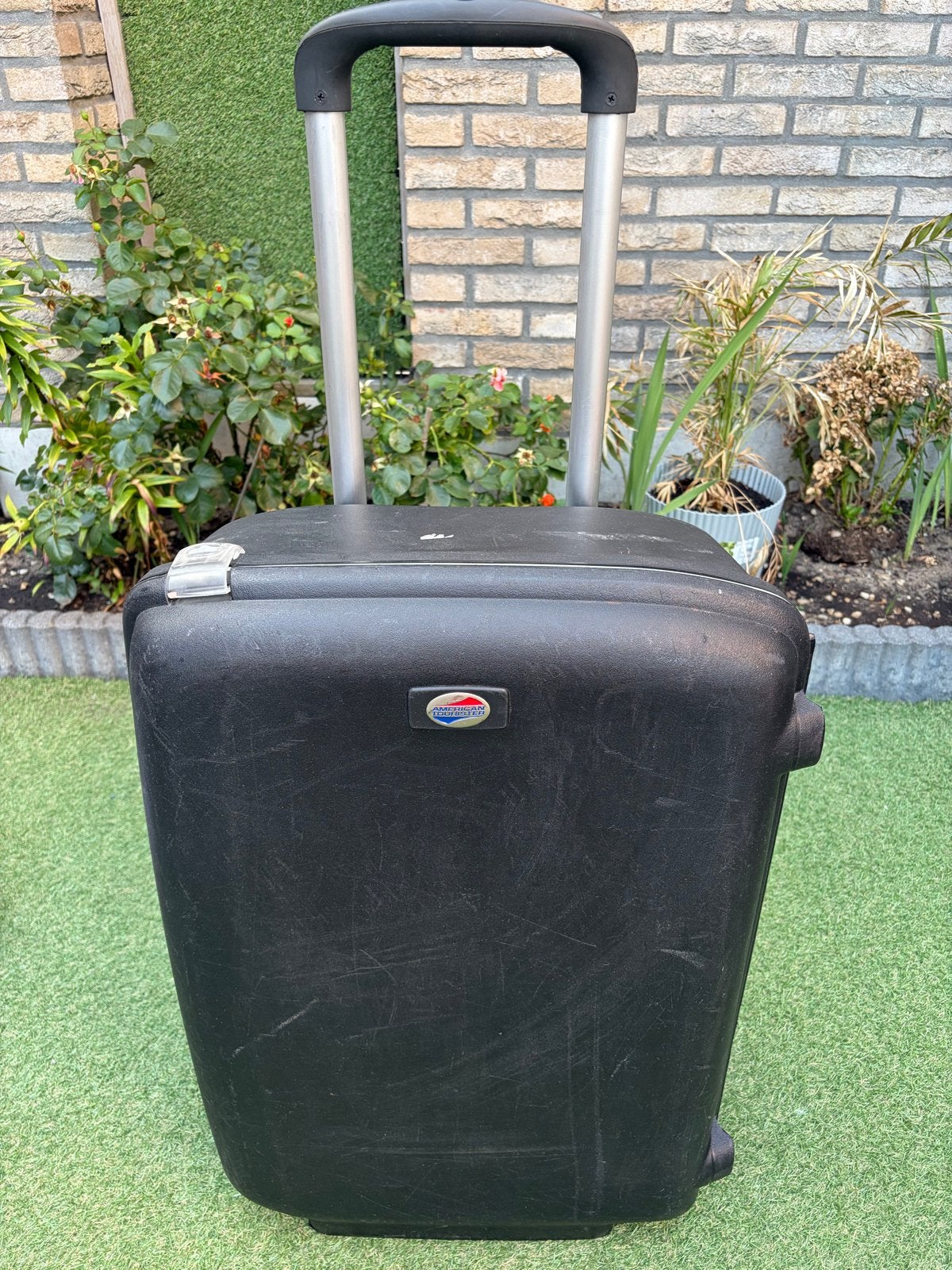 American Tourister Koffer Zwart - 67 cm - Gebruikt, Sieraden, Tassen en Uiterlijk, Koffers, Gebruikt, Hard kunststof, Slot, 35 tot 45 cm
