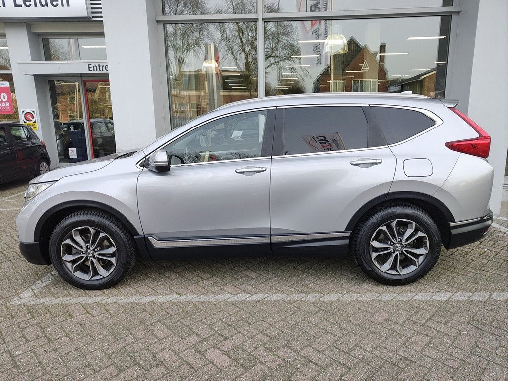 Honda CR-V 2.0 E:HEV HYBRID ELEGANCE Leder | Dodehoeksensore, Auto's, Honda, 12 maanden, Gebruikt, 4 cilinders, Bedrijf