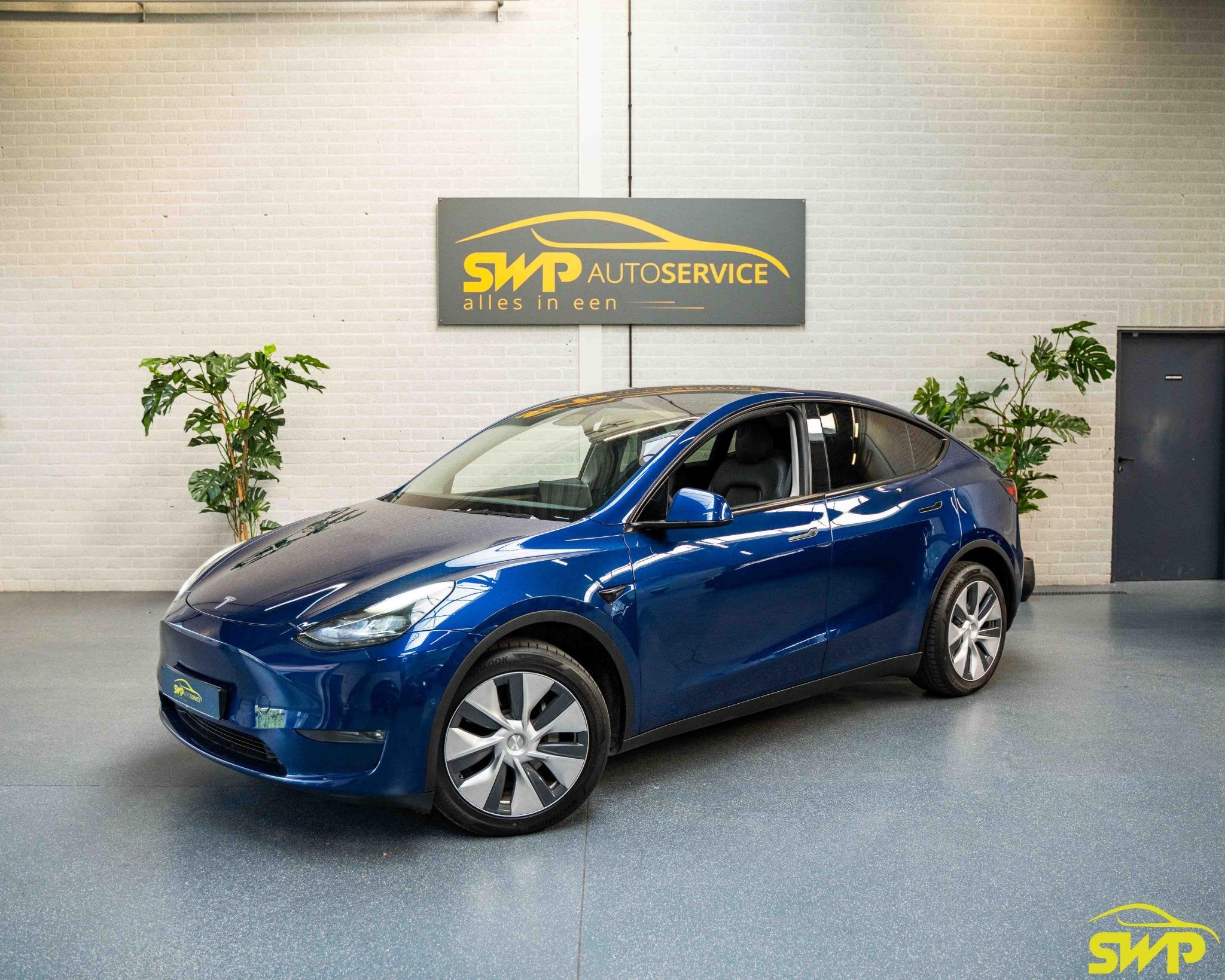 Tesla Model Y Long Range AWD 75 kWh | Autopilot | Leer | Pan, Auto's, Automaat, Stof, Gebruikt, 351 pk