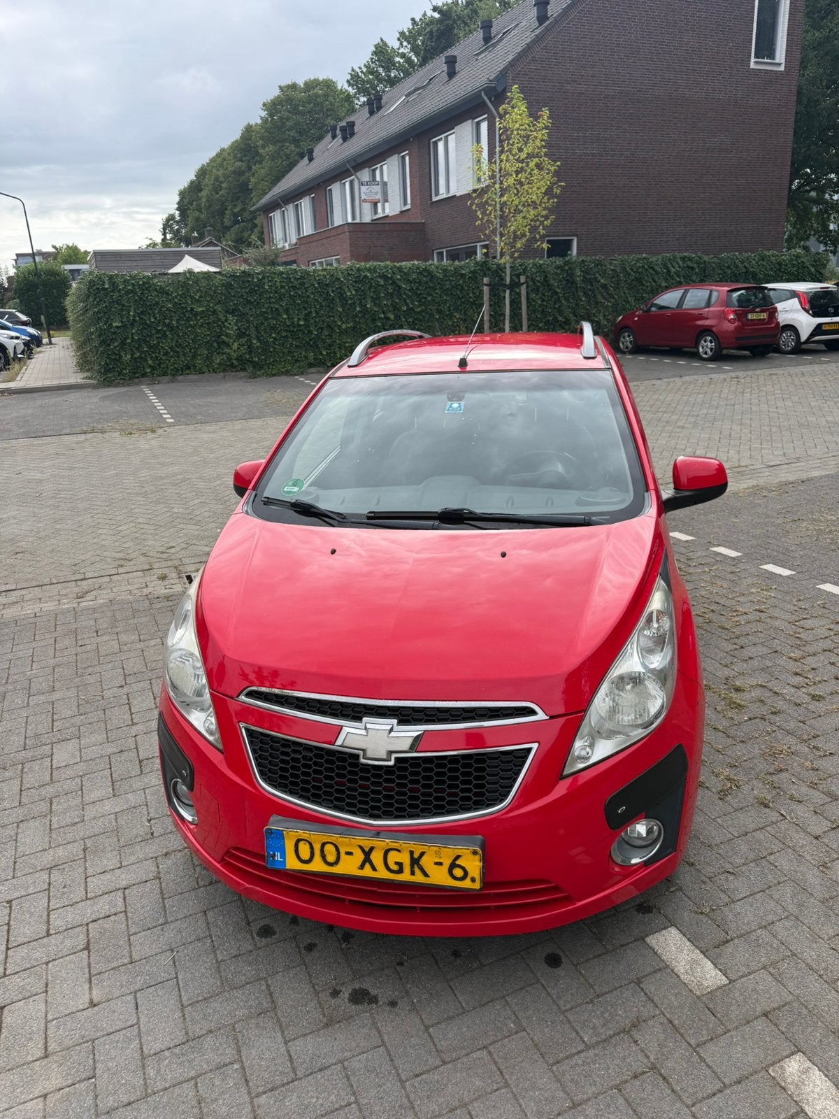 Chevrolet Spark 1.0 Bifuel 2012 Rood, Auto's, Chevrolet, 15 km/l, 37 €/maand, 4 cilinders, Origineel Nederlands