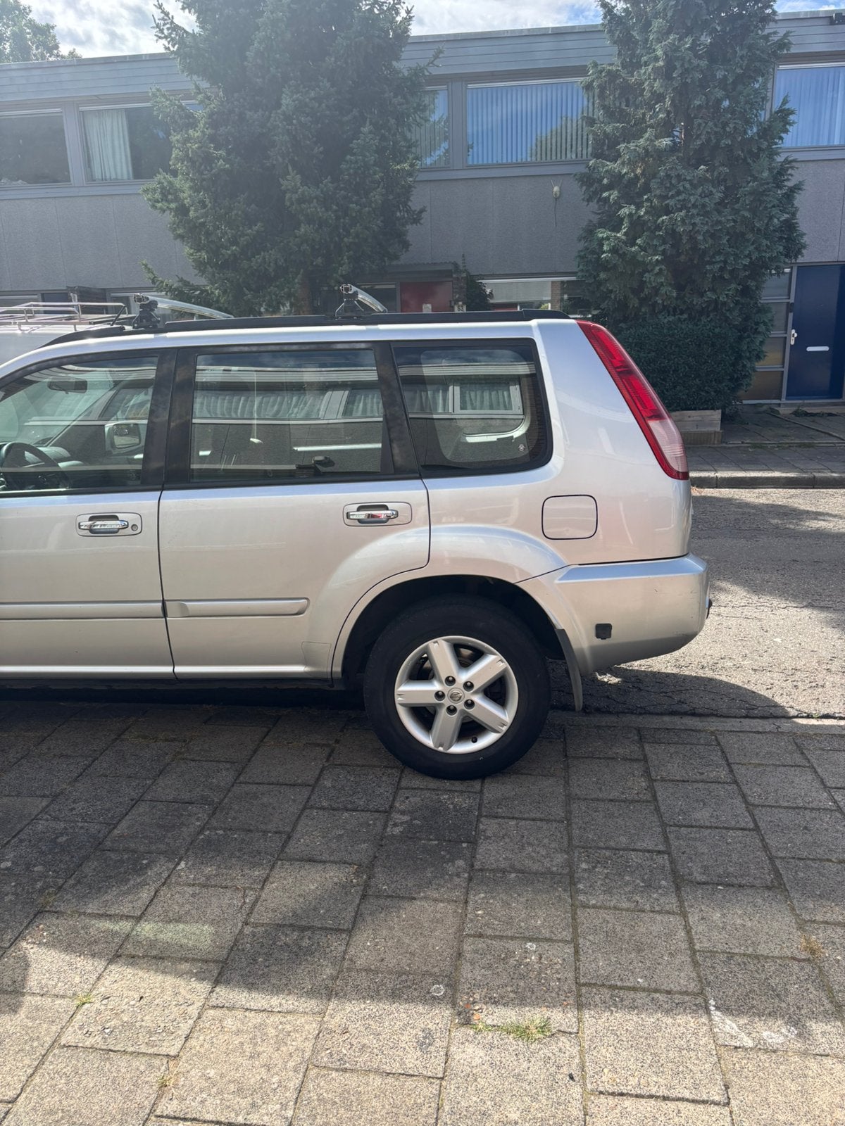 Foto 9 van Nissan X-Trail 2.0 2WD 140PK 2006 Grijs
