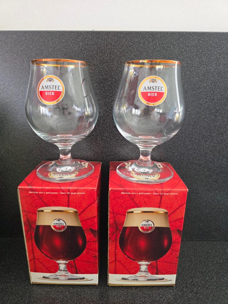 2 Amstel Bier bockglazen met gouden rand, nieuw in doos, Verzamelen, Biermerken, Ophalen of Verzenden, Nieuw, Glas of Glazen, Amstel