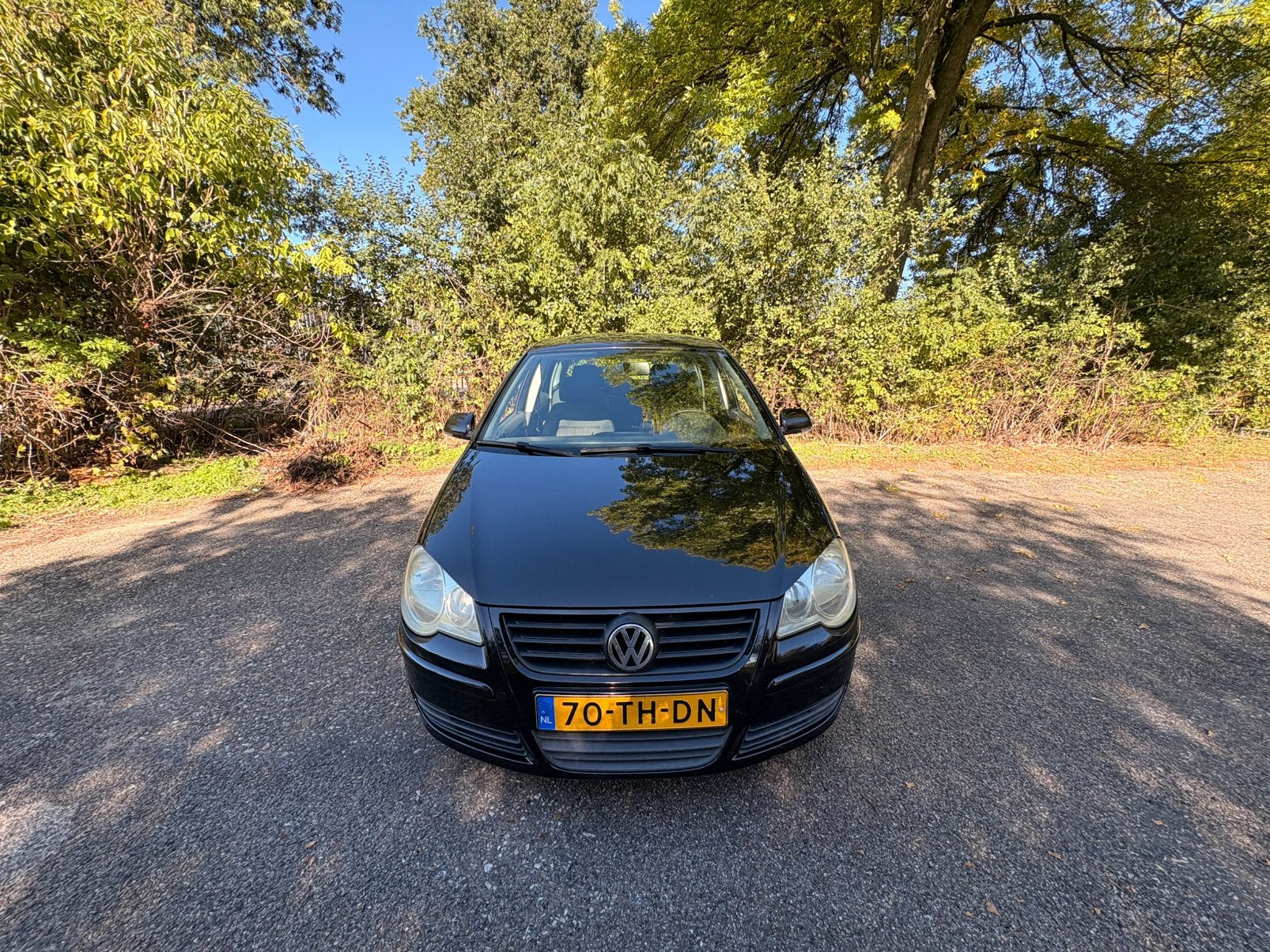 Volkswagen Polo 1.4 16V 59KW 2006 Zwart 5D, Auto's, Voorwielaandrijving, 15 km/l, 40 €/maand, 4 cilinders