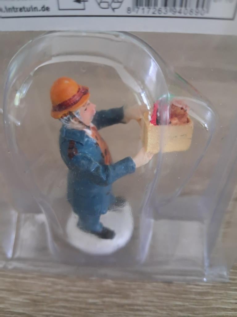 Intratuin man met kadootje, Ophalen