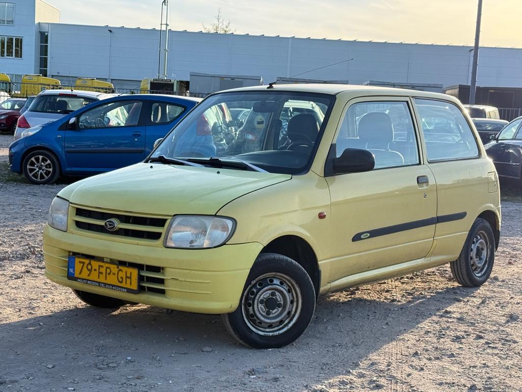 Daihatsu Cuore 1.0-12V STi/KONINGS DAG KOOPJE, 4 stoelen, Cuore, Origineel Nederlands, Handgeschakeld