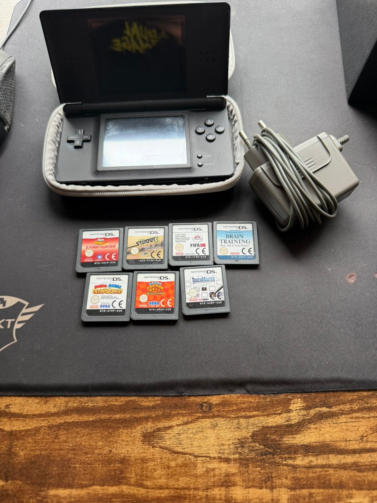Nintendo DS Lite Zwart met 7 games en hoes, Spelcomputers en Games, Zwart, Ophalen of Verzenden, DS Lite, Gebruikt