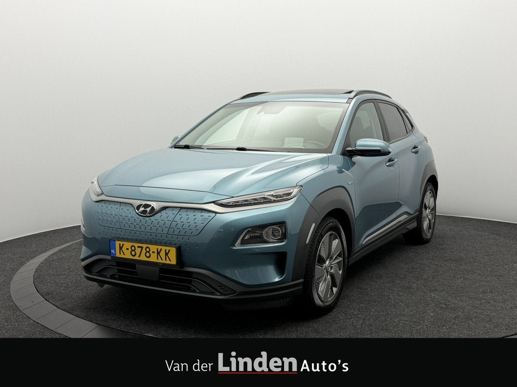 Hyundai KONA EV Limited 64 kWh 3- Fase SOH 95,6% | Warmtepom, Auto's, Hyundai, Gebruikt, Zwart, Blauw, 39 min
