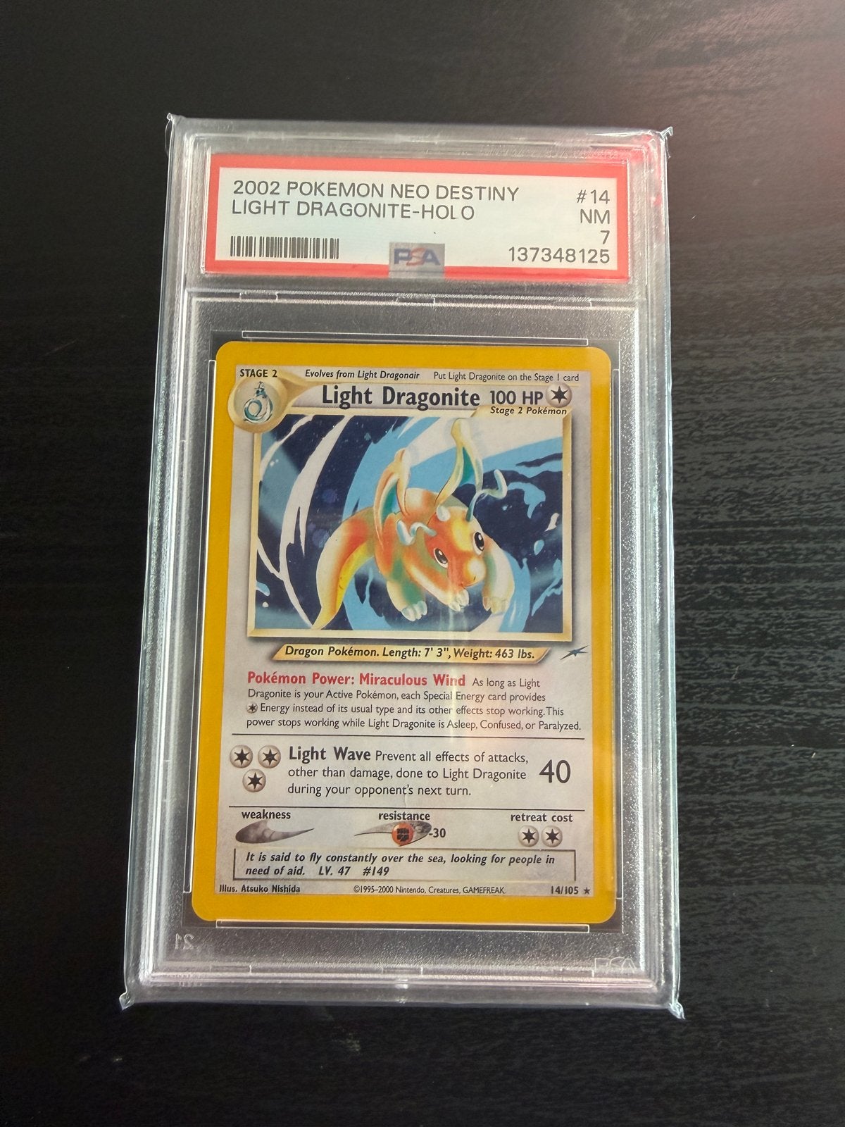 PSA 7 Light Dragonite Holo #14 Neo Destiny Pokémon Kaart, Hobby en Vrije tijd, Verzamelkaartspellen | Pokémon, Ophalen of Verzenden