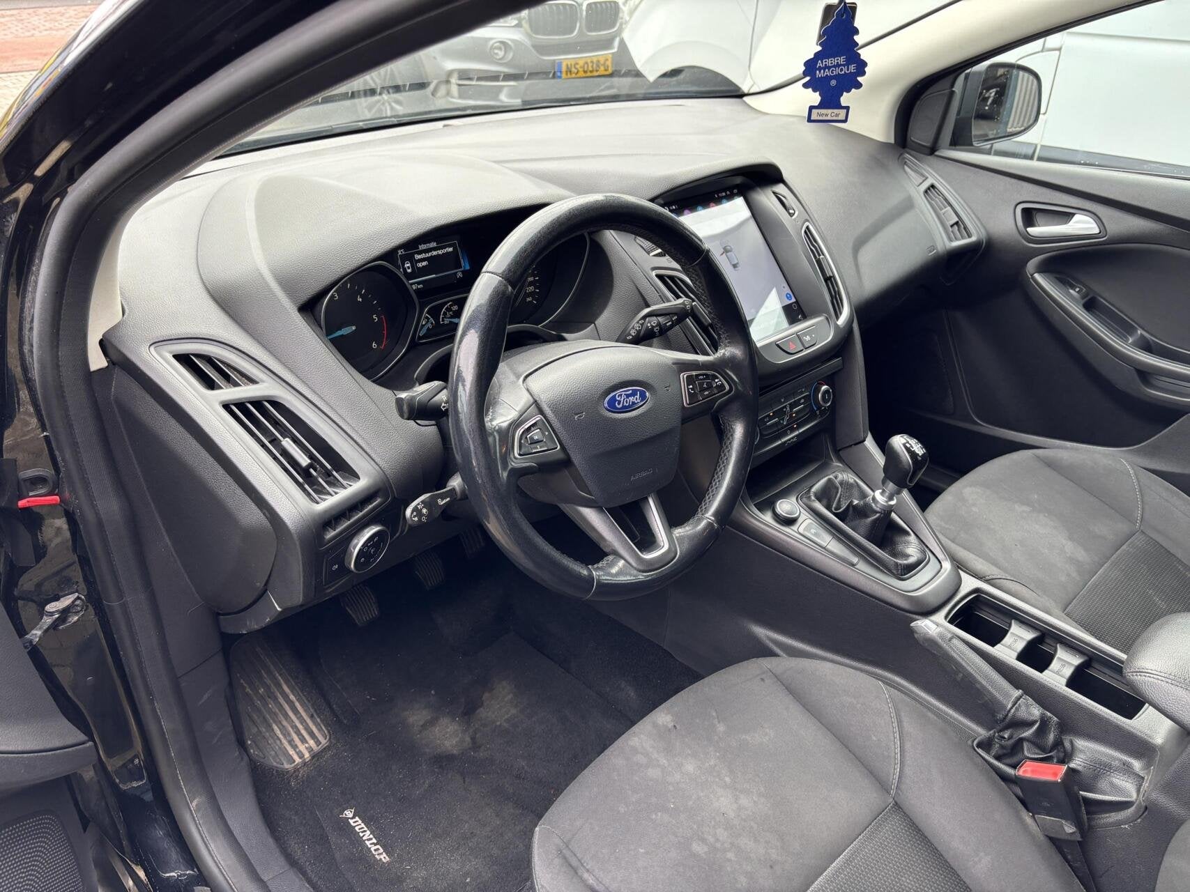 Ford Focus Wagon 1.5 TDCI - Airco - Cruise - Navi, Auto's, Stof, Gebruikt, 4 cilinders, Zwart