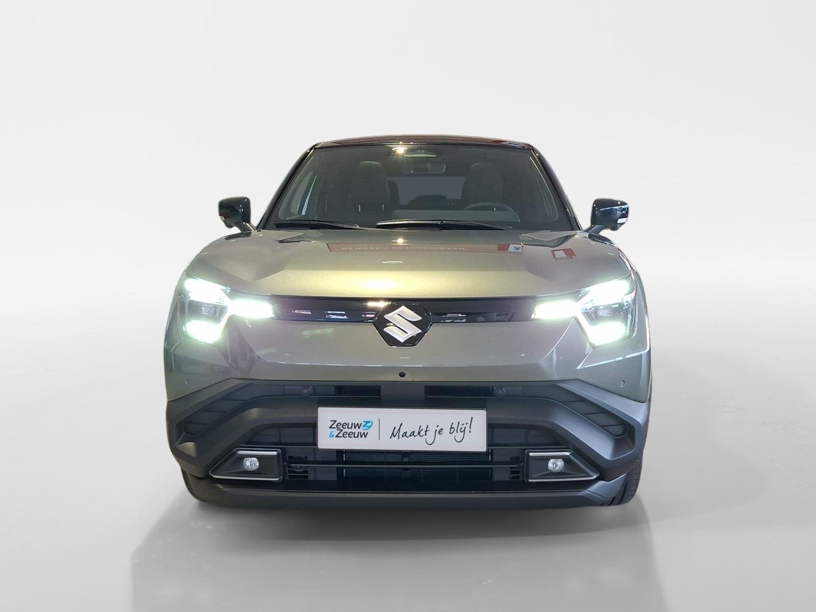 Suzuki e VITARA Style 61 kWh | €2000 euro inruil premie |, Auto's, 750 kg, Overige kleuren, Leder en Stof, 360 min
