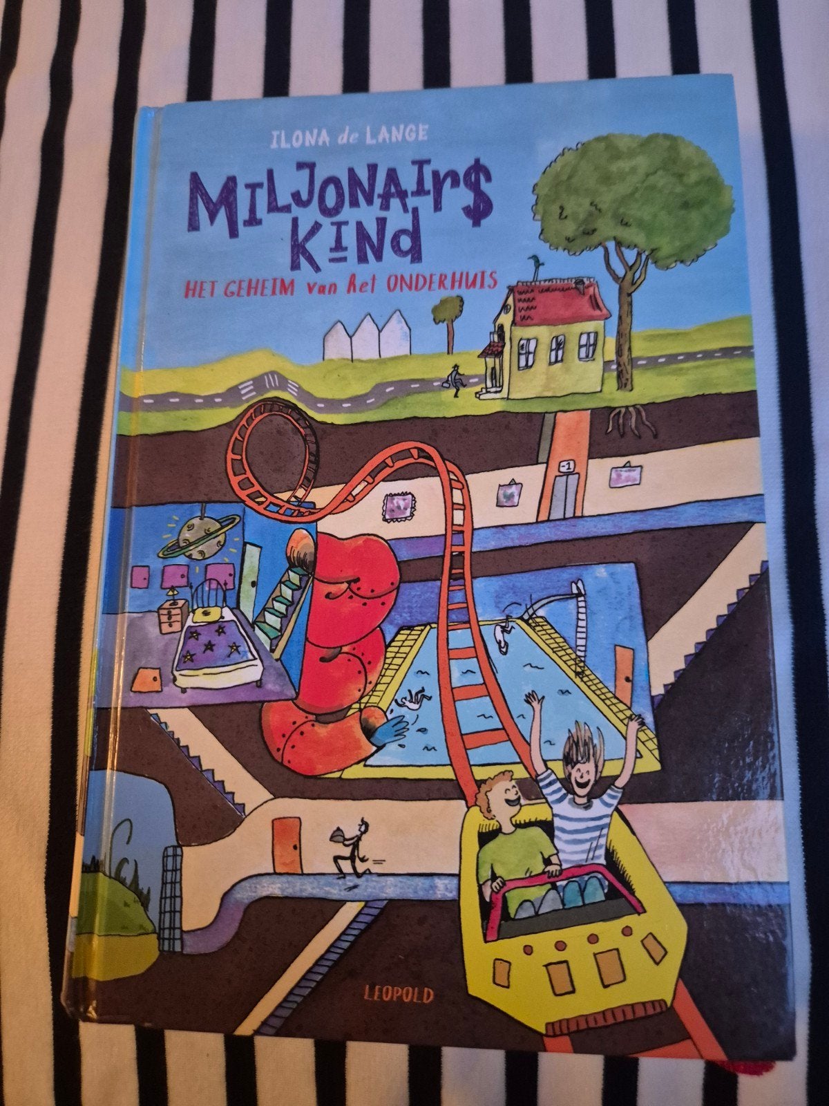 Miljonairskind: Het geheim van het onderhuis, Boeken, Ophalen of Verzenden, Zo goed als nieuw, Ilona de Lange, Fictie