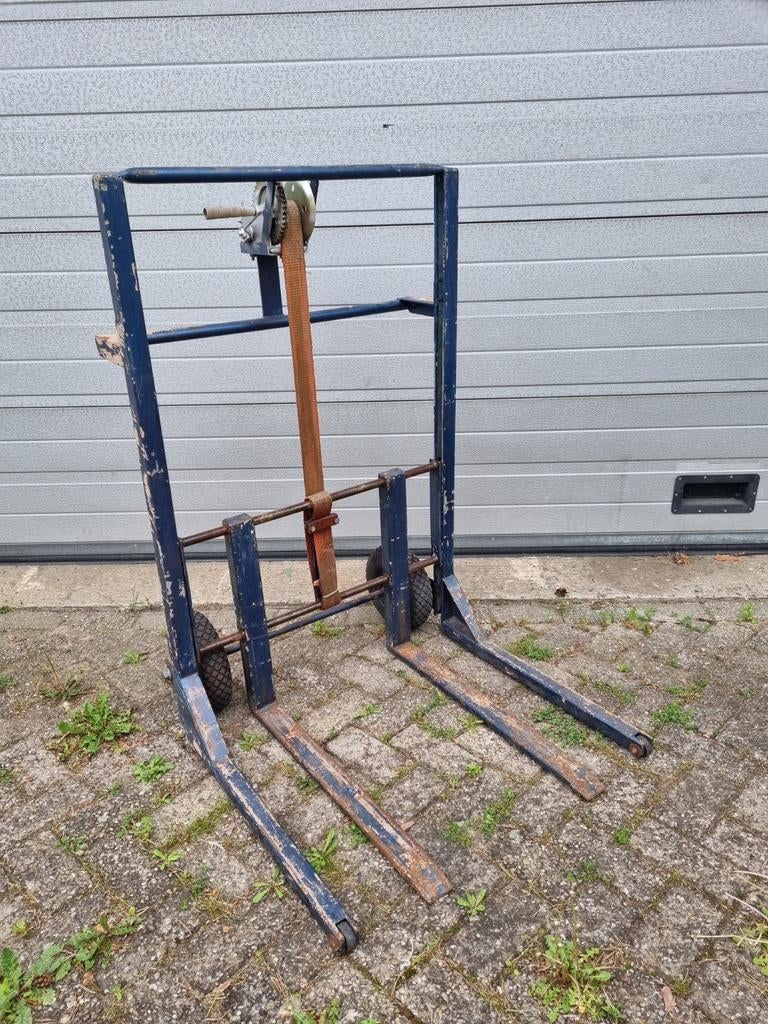Hand stapelaar hefhulp, Ophalen
