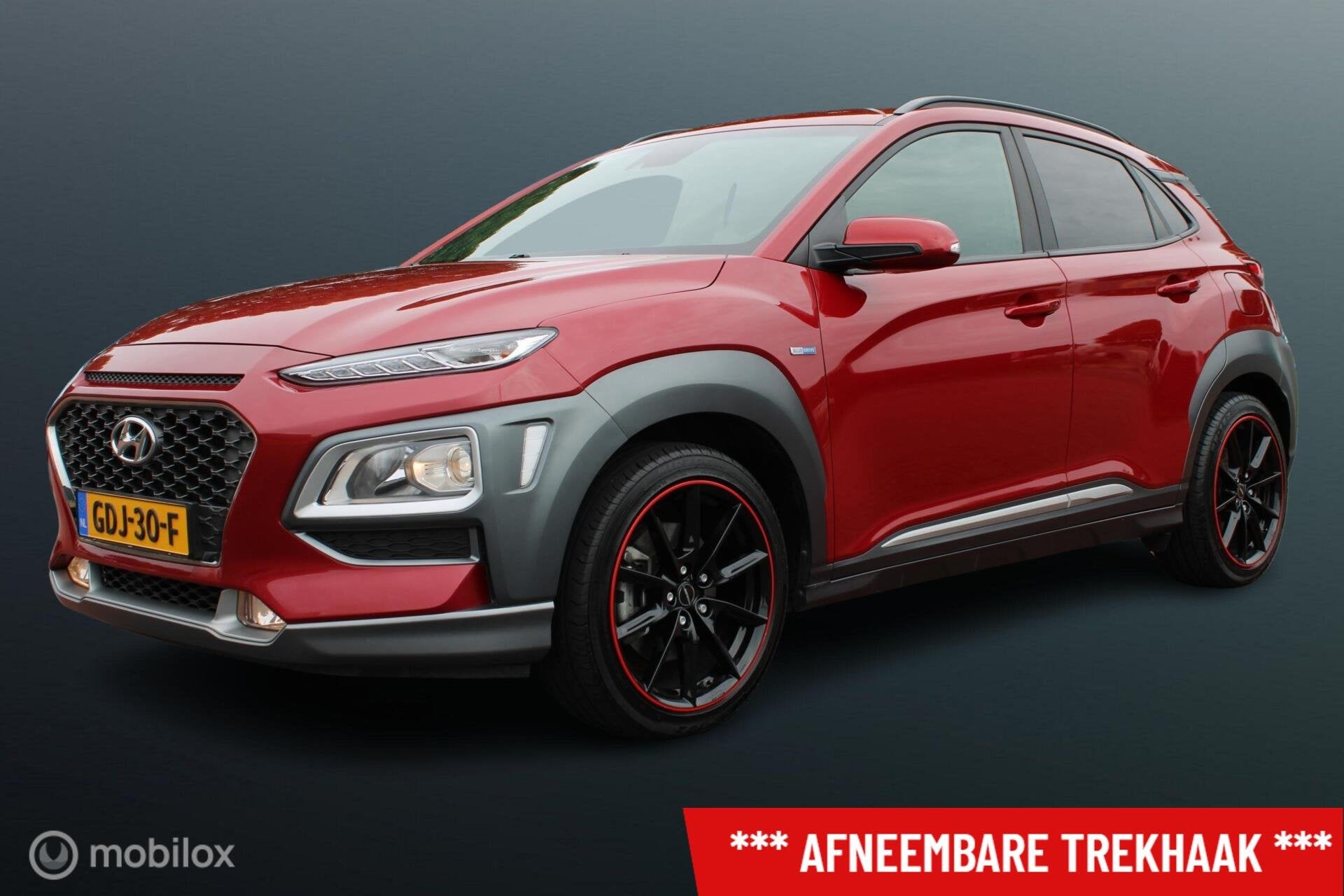Hyundai Kona 1.6 GDI HEV Fashion Sport, Rosso Color Package,, Auto's, Gebruikt, Leder en Stof, Bedrijf, 19 km/l