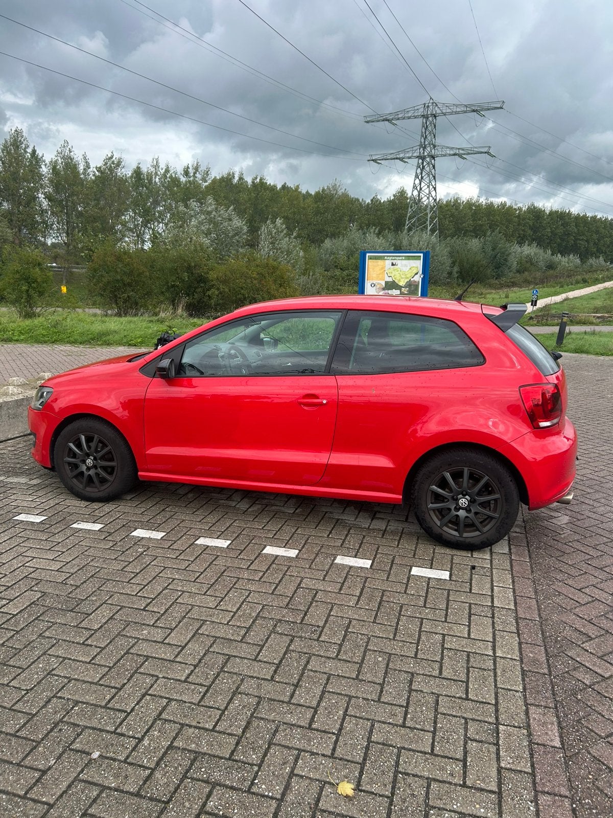 Volkswagen Polo 1.4 63KW AUT 2010 Rood, Auto's, 40 €/maand, 4 cilinders, Bedrijf, 1000 kg