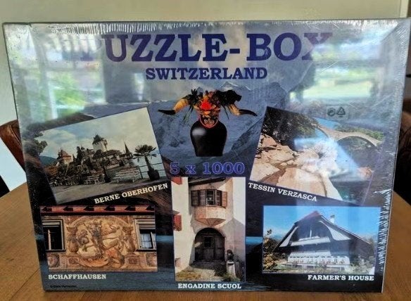 Puzzel-Box Switzerland 5x1000 stukjes - Nieuw in folie, Ophalen, Meer dan 1500 stukjes, Nieuw, Legpuzzel