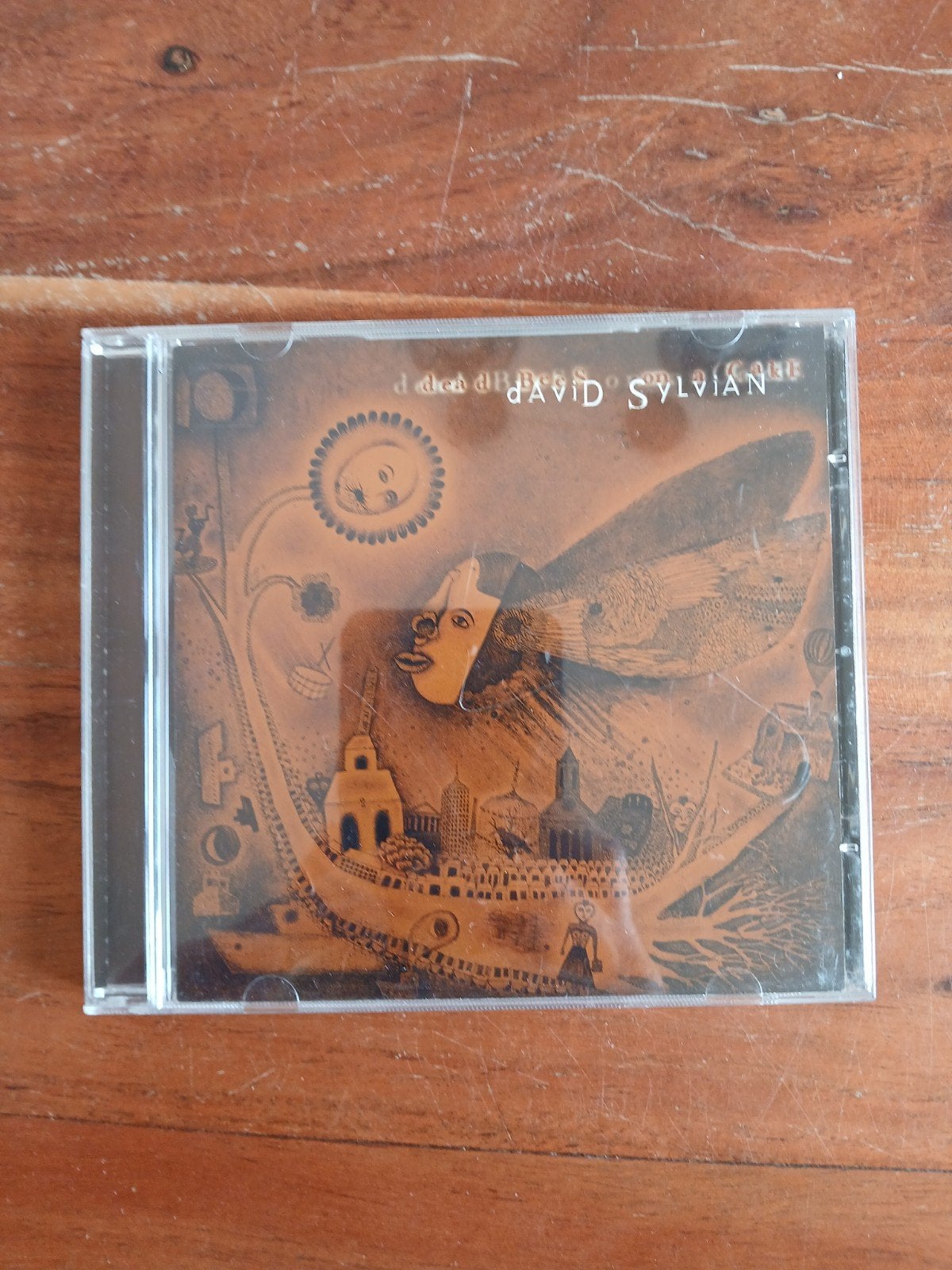 David Sylvian - Dead Bees on a Cake CD (Pop/Rock), Inclusief boekje, Gebruikt, Pop, Ophalen of Verzenden