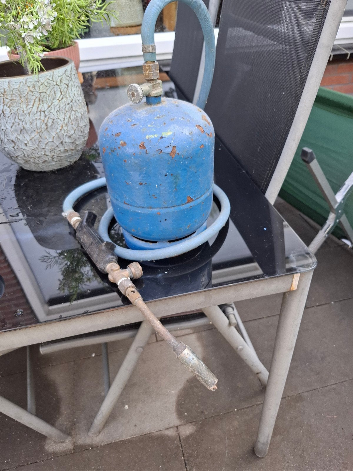 Gasbrander plus fles, Ophalen