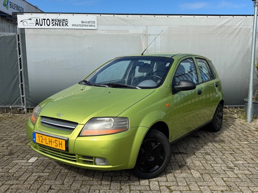 Daewoo Kalos 1.4 Spirit - APK 03-27 - Elektr ramen, Auto's, Daewoo, Stof, Zwart, 4 cilinders, Kalos