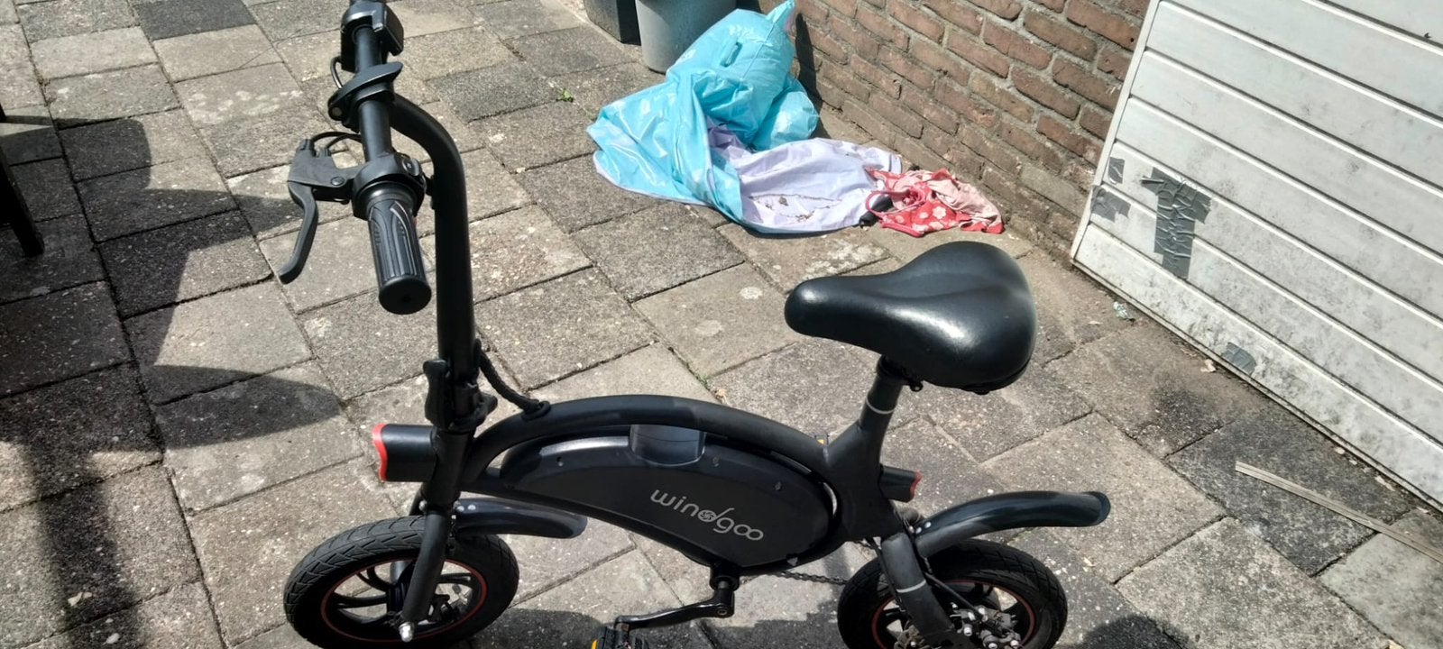 Wingoo met lader, Ophalen, Zo goed als nieuw